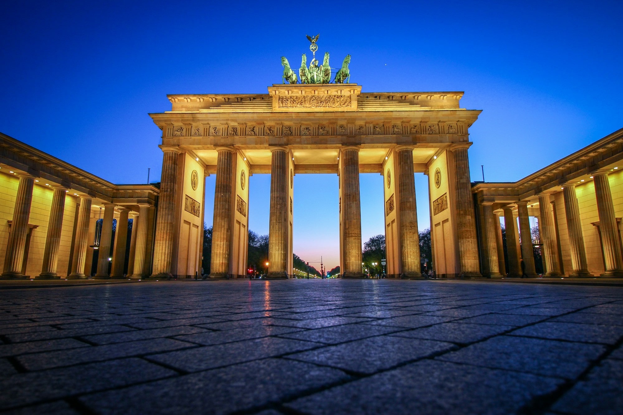 Evening picture with an old beautiful arch way with pillars lit up