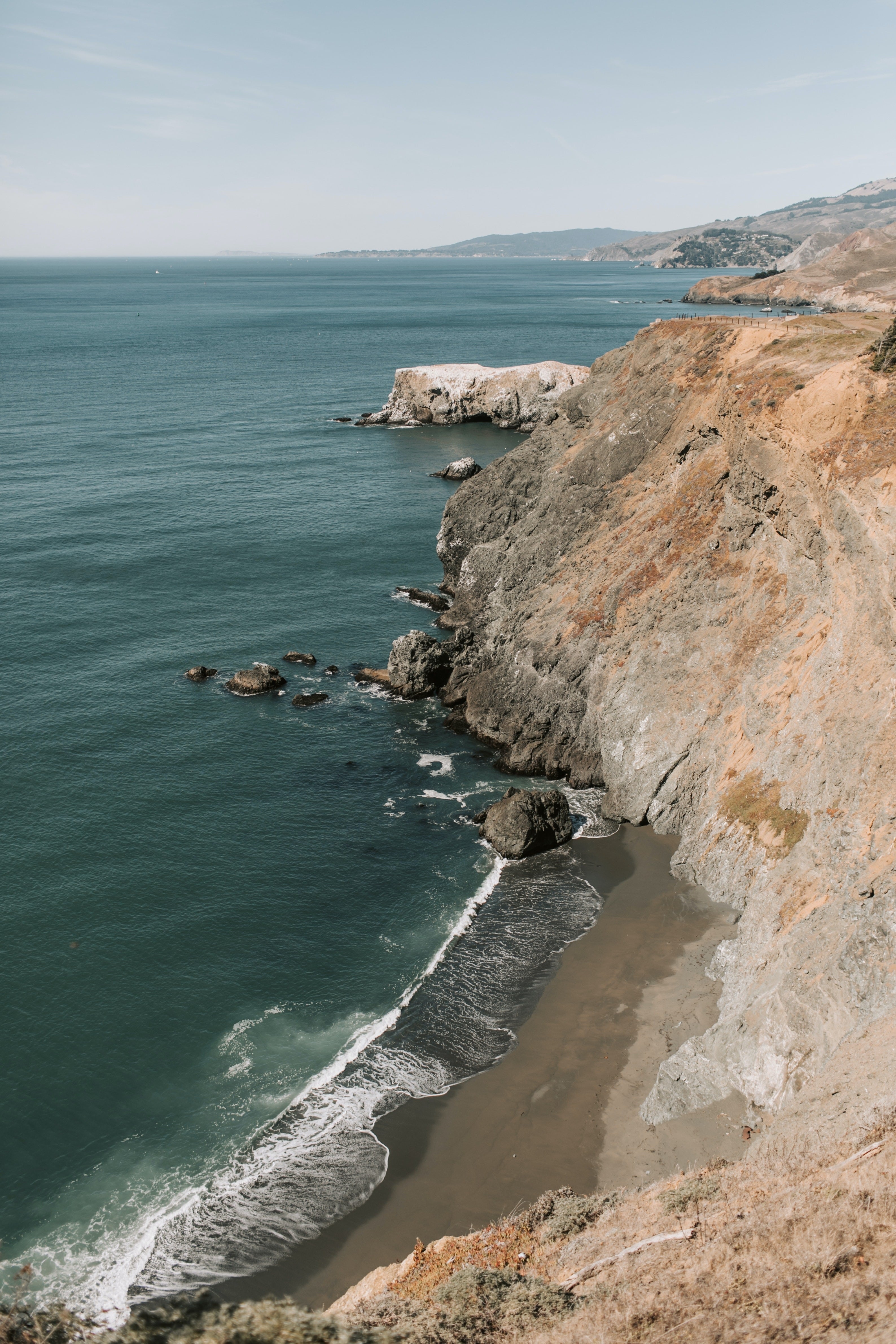 Experience the breathtaking beauty of South America perched on majestic cliffs. Let DREW TRAVEL be your gateway to the awe-inspiring landscapes.